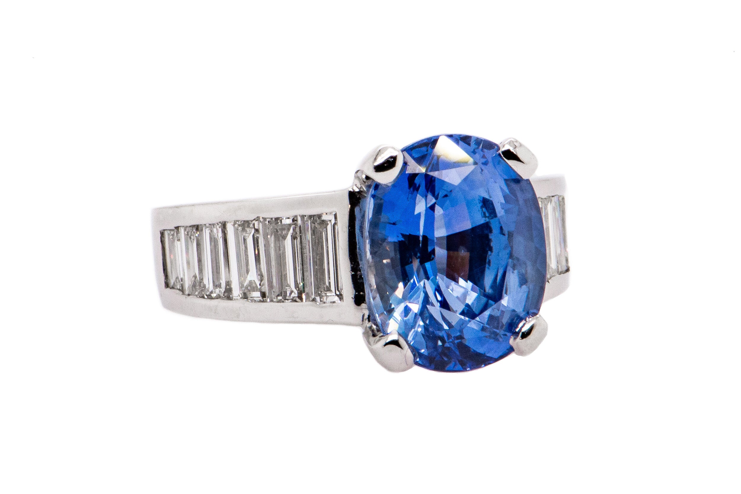 6.63ct Oval Sapphire and Baguette cut diamond ring