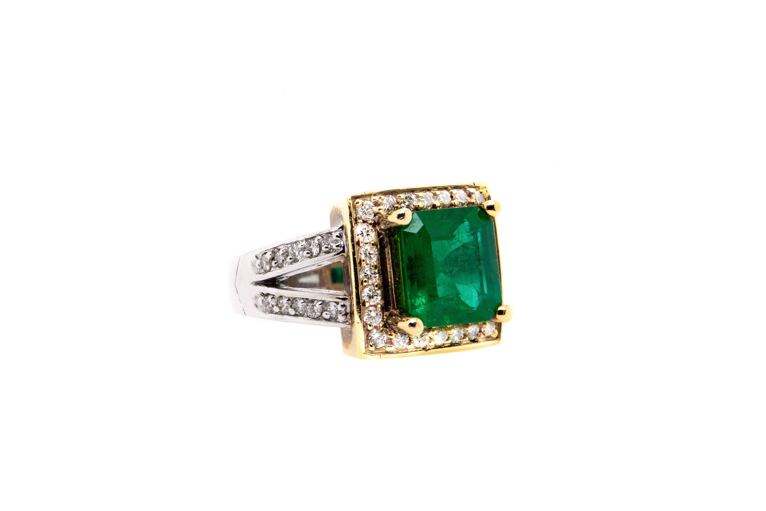 The Unique Collection: Emerald and Diamond ring in 18k White and Yellow Gold