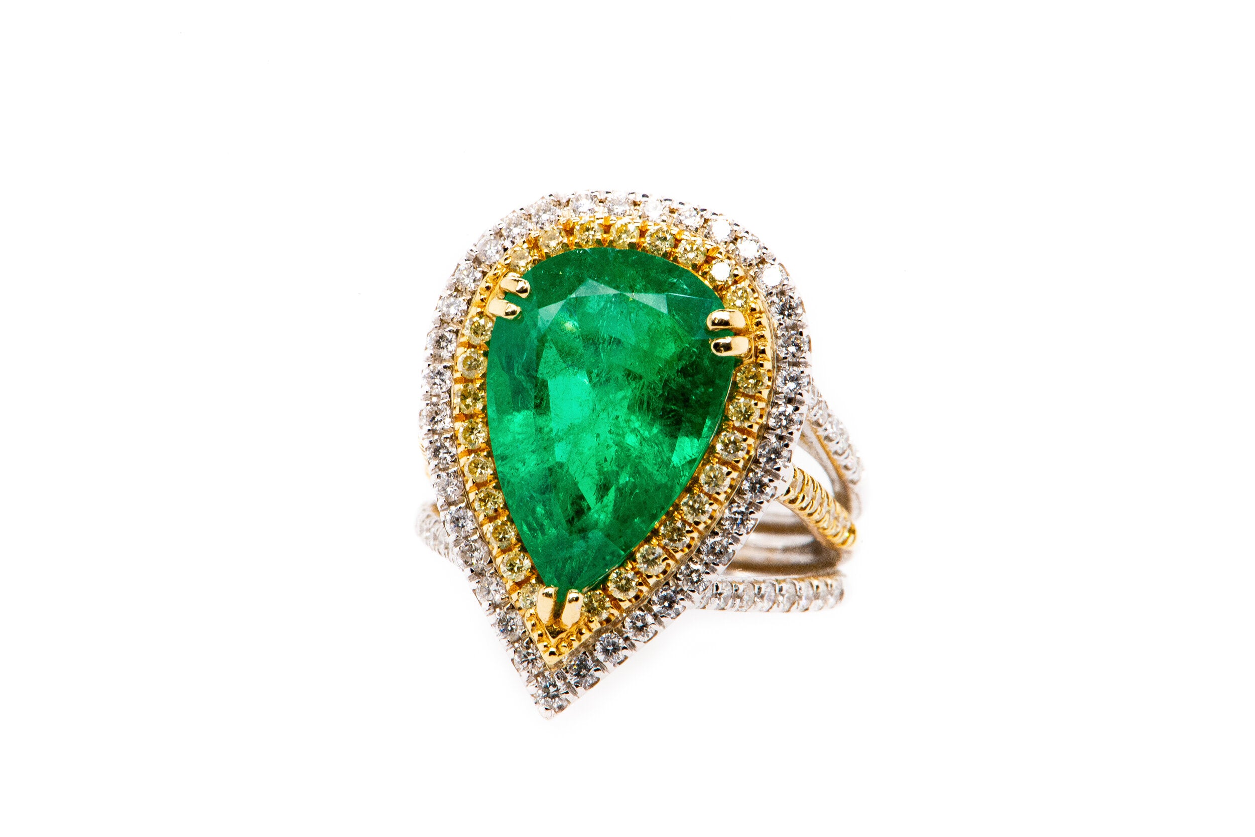 The Unique Collection: 6.91 ct Pear Shape Emerald in Two Tone Yellow and White Diamond Custom Setting