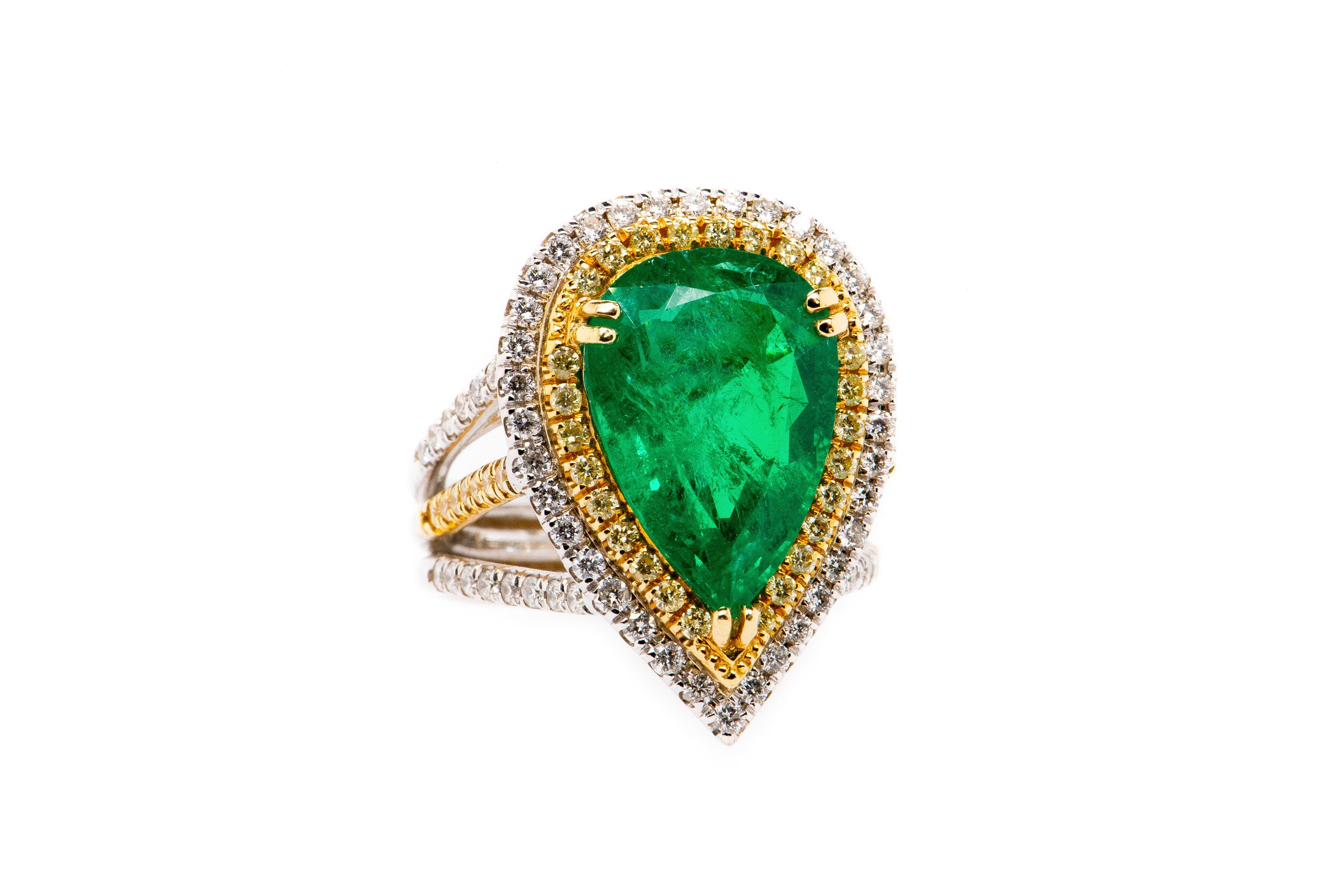 The Unique Collection: 6.91 ct Pear Shape Emerald in Two Tone Yellow and White Diamond Custom Setting
